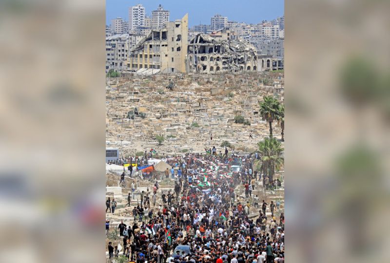 World News: Gazans perform mass funeral of 112 bodies recovered after three years